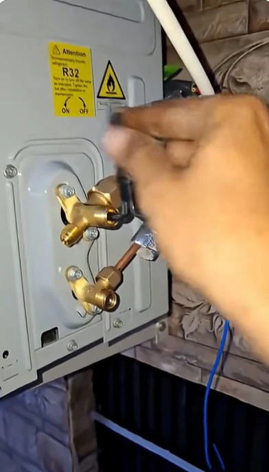Appliance service technician working on equipment for a home in the Abilene service area