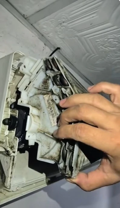 Appliance technician servicing equipment in a South Abilene home